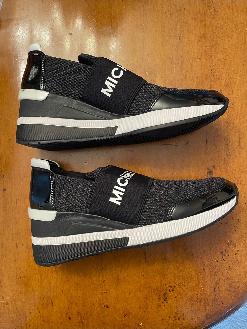 MICHAEL Michael Kors Black and White Flex Wedge Slip-On Mesh Sneakers